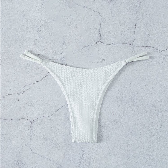 Plain white swim suit bottoms from shein size (xs) never worn - Picture 2 of 4